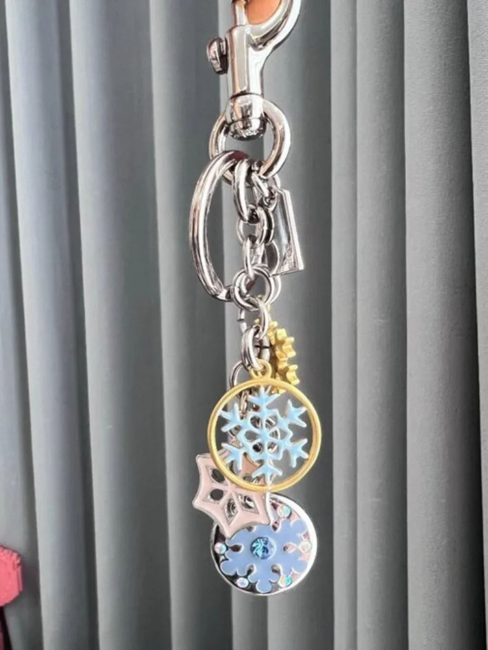 Coach Silver-Tone & Light Blue Snowflake Charm Keychain with Gold Accent